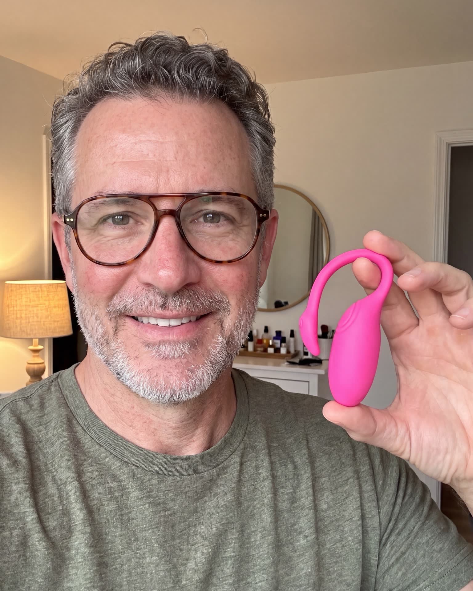 He holds up the Flamingo with a grin — his first one too