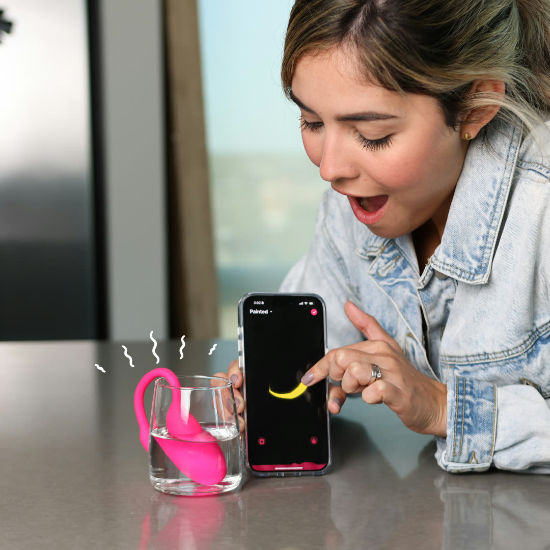 She reacts as the app connects — pairing moment